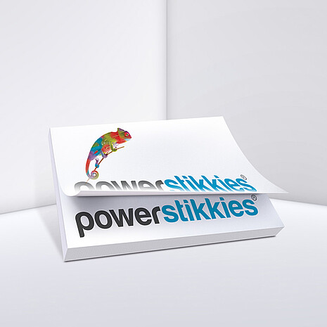 Weißer Haftnotizblock mit Aufdruck "Powerstikkies" und Chamäleon
