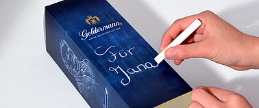 Sektverpackung mit Kreide beschreibbar