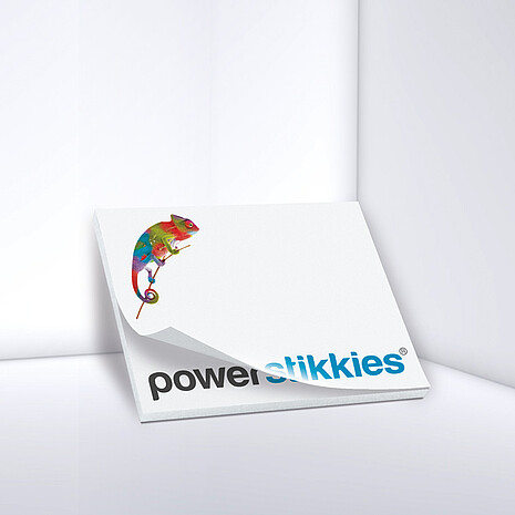 Weißer Haftnotizblock mit Aufdruck "Powerstikkies" und Chamäleon